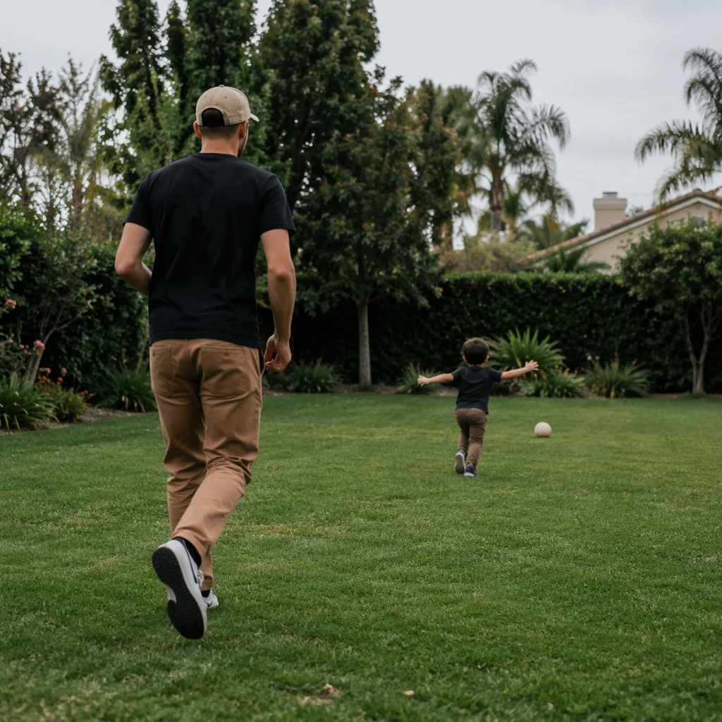 Father and Son Playing Catch Outdoors