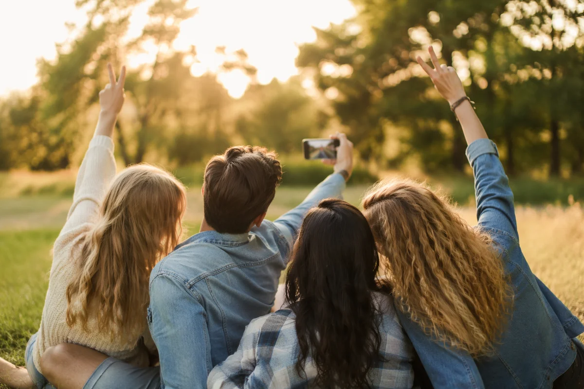 Friends Taking Selfie in Sunny Park