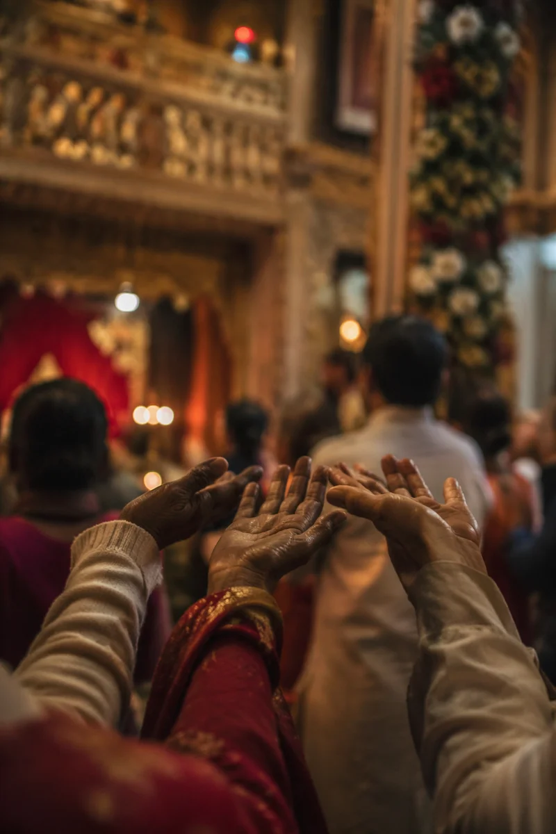Hands Reaching Forward in Warm Light