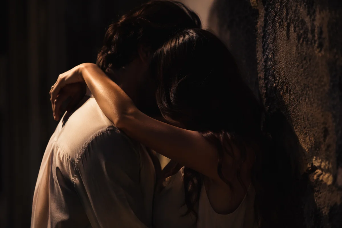 Tender Couple Embrace in Warm Shadow