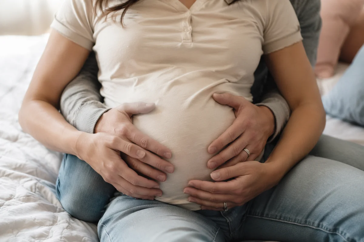 Tender Expectant Family Hands on Belly