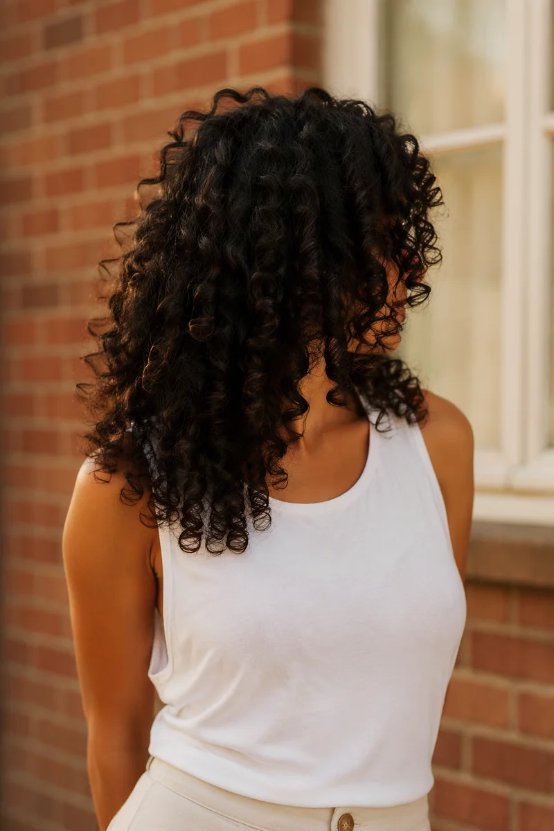 Confident Woman with Natural Curly Hair