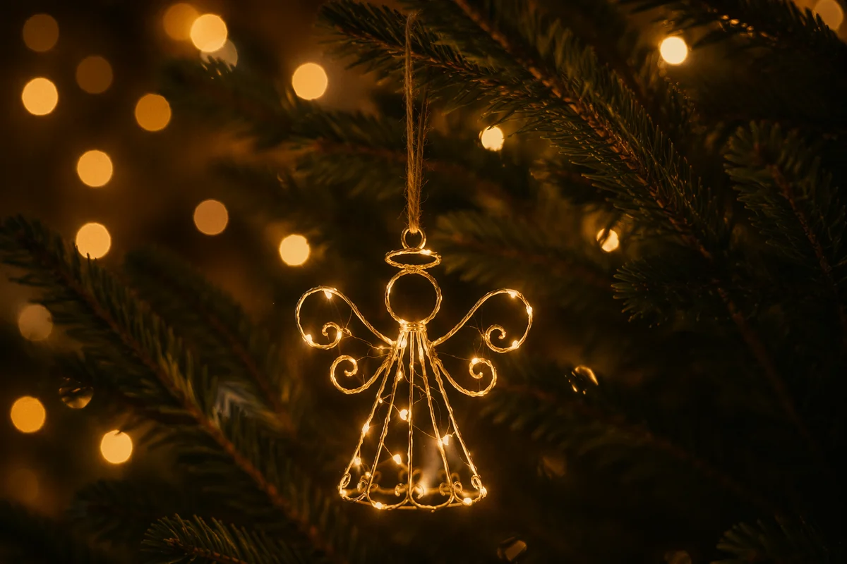 Glowing Angel Ornament on Christmas Tree