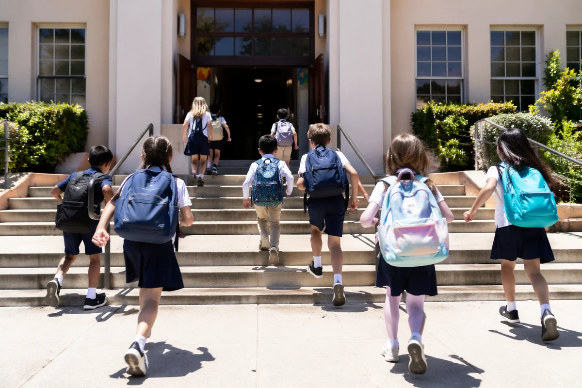 Children Entering School After Morning Prayer