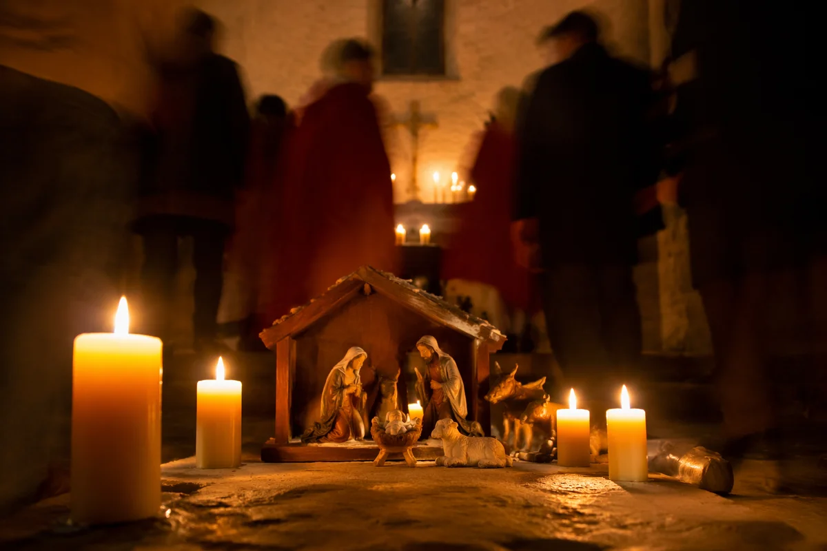 Candlelit Nativity in Rustic Chapel