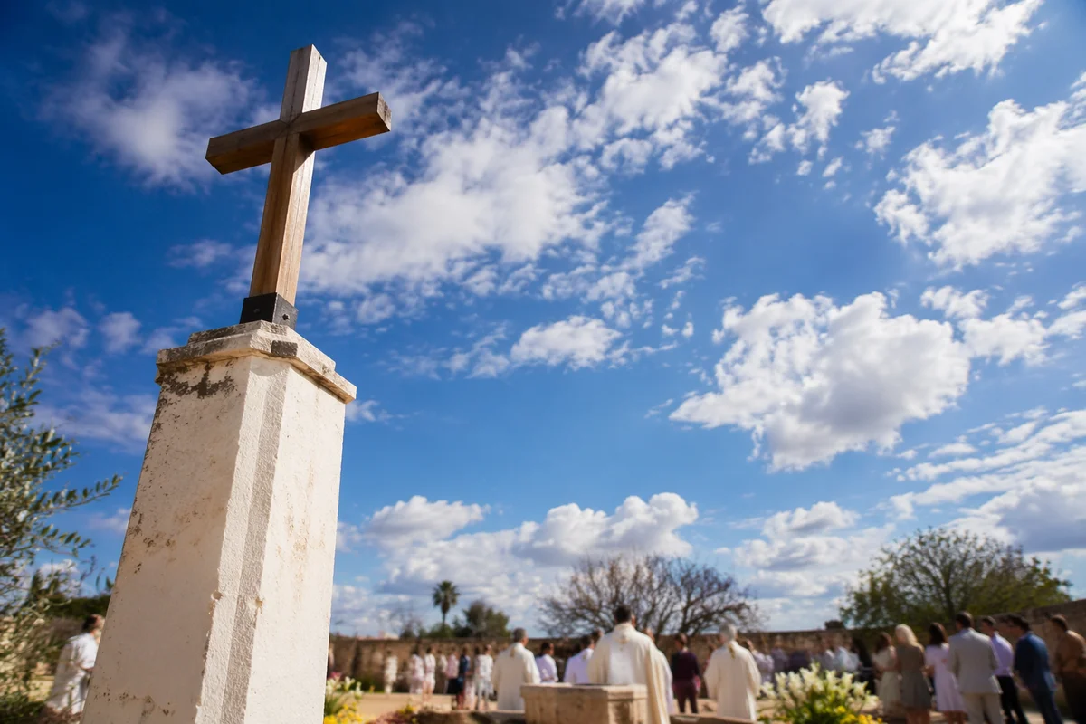 Easter Baptism Cross Under Spring Sky