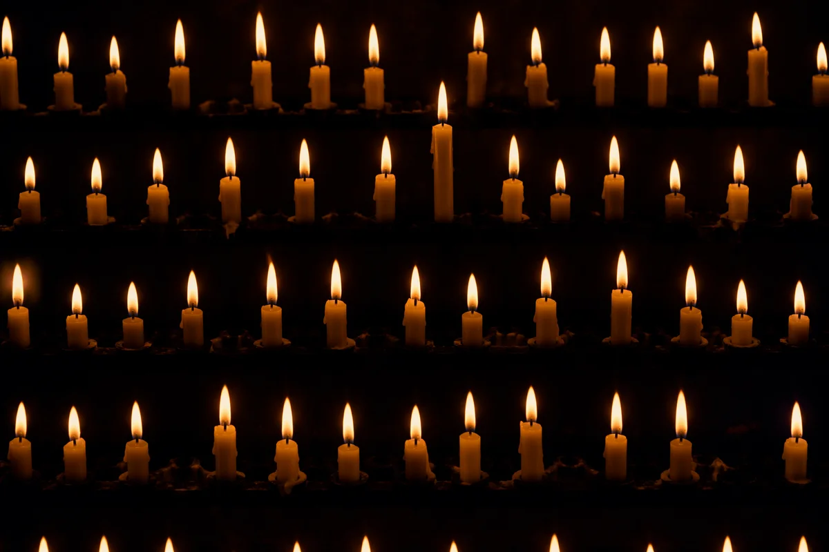 Easter Vigil Candle Flames in Dark Church