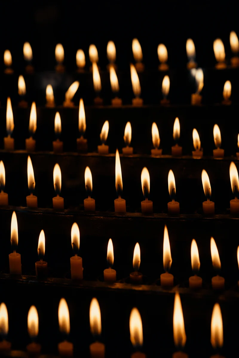 Easter Vigil Candle Flames in Dark Church