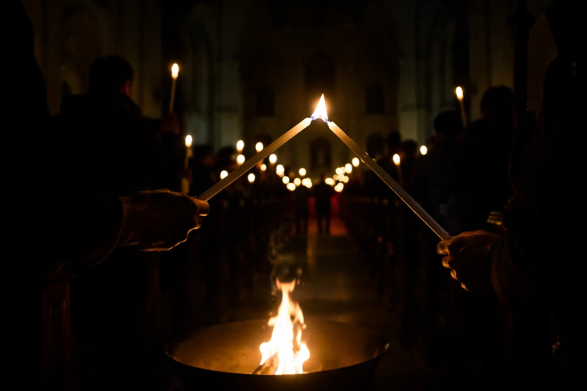 Easter Vigil Candle Lighting in Dark Church