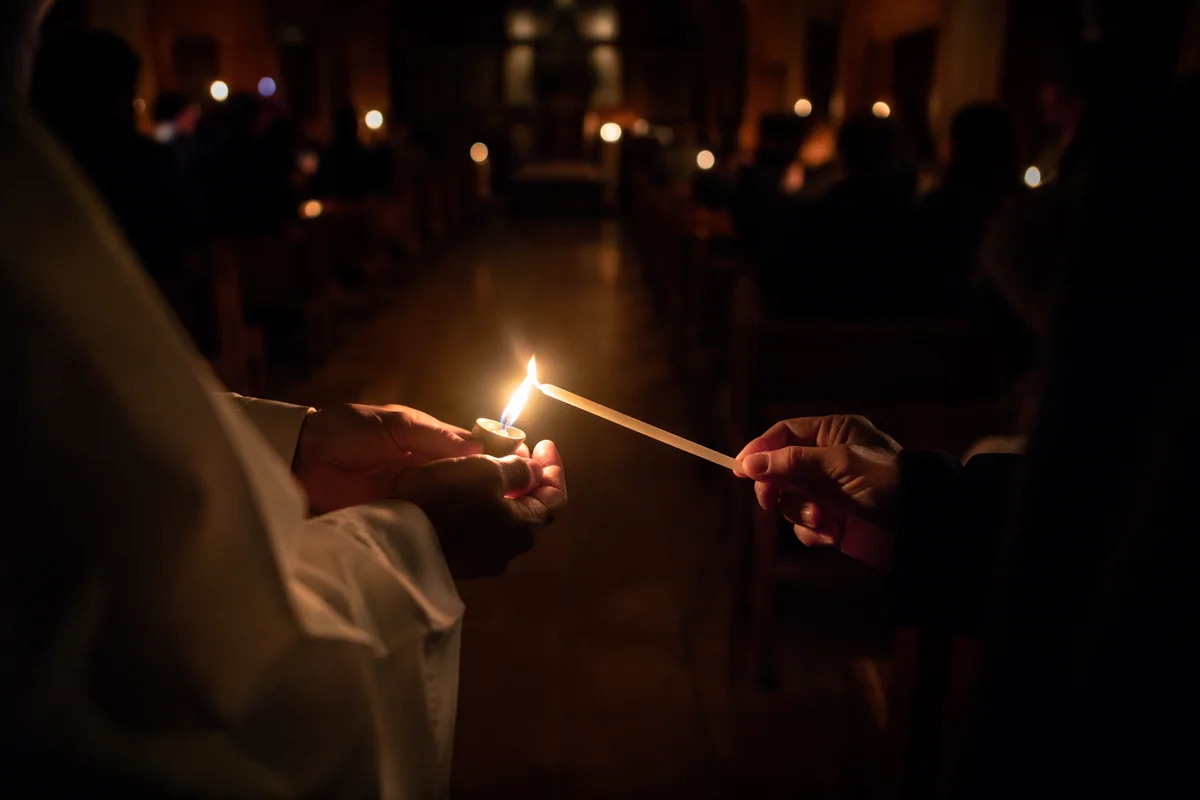 Easter Vigil Candle Lighting in Dark Church