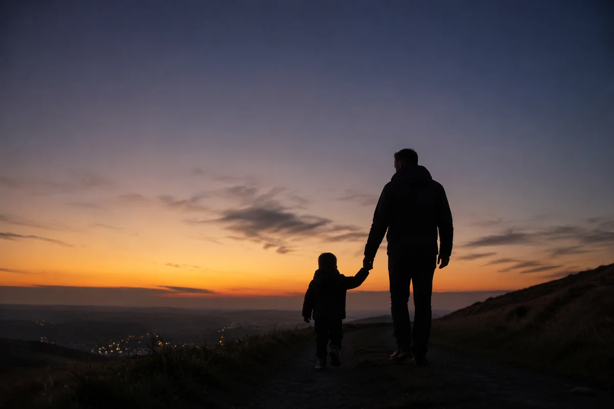 Father and Child Walking at Sunset