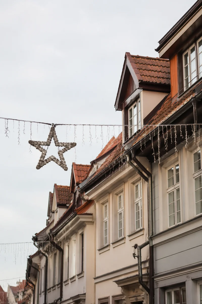 Christmas Lights Hanging on Rooftop Street