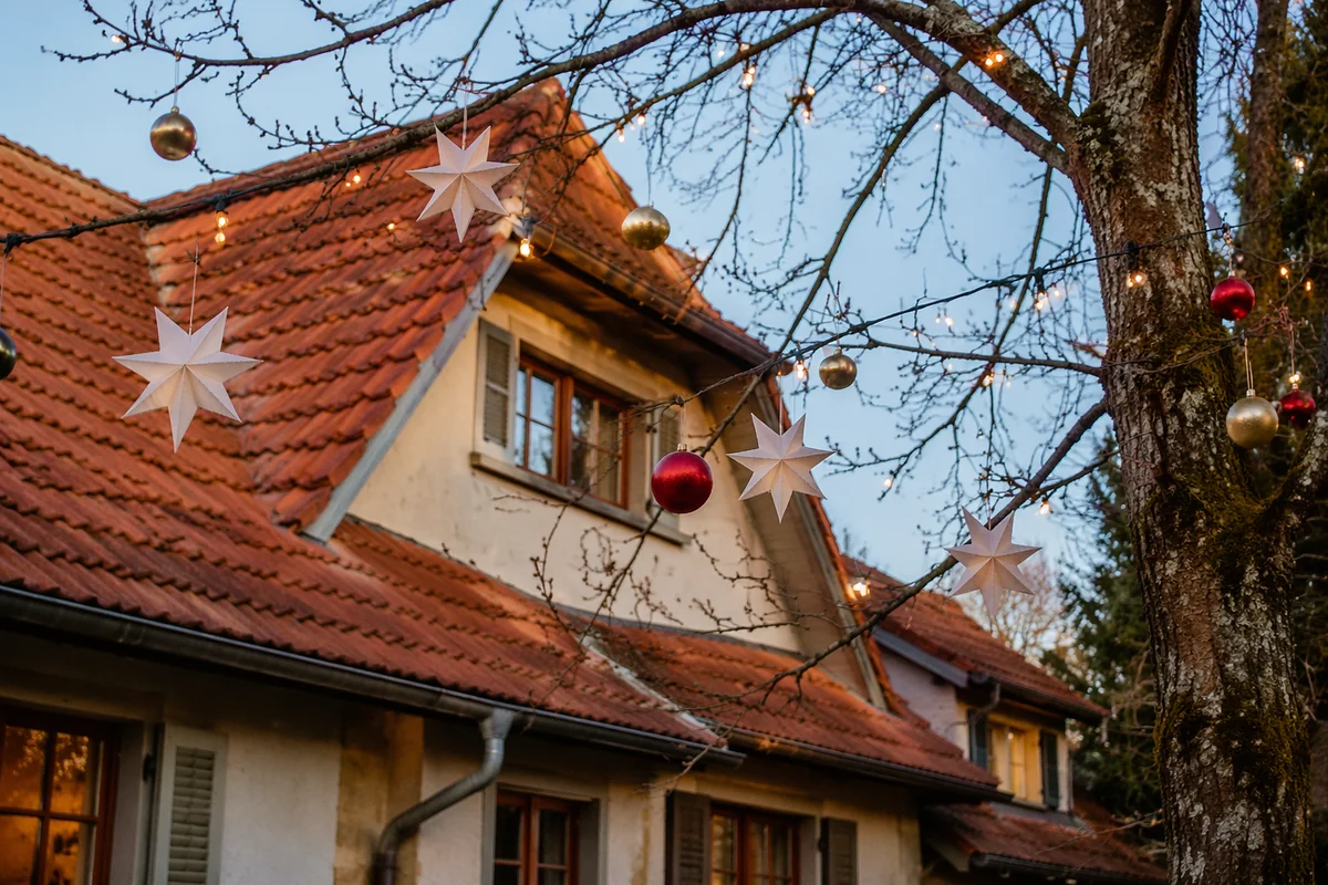Cozy House Rooftop Christmas Lights Scene