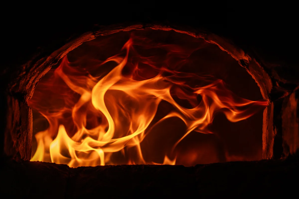 Pentecost Flames in Dark Arched Chamber