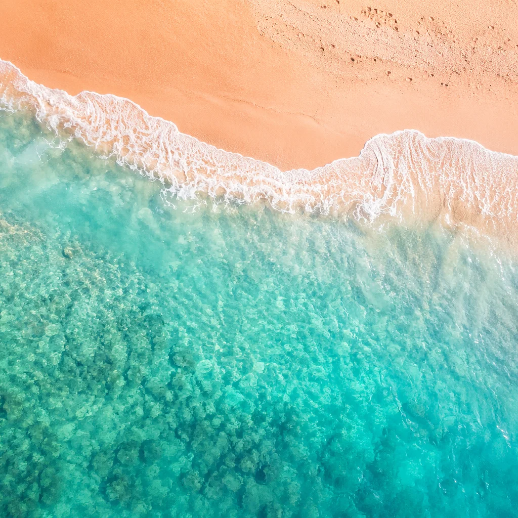 Serene Tropical Beach Sunset Aerial View