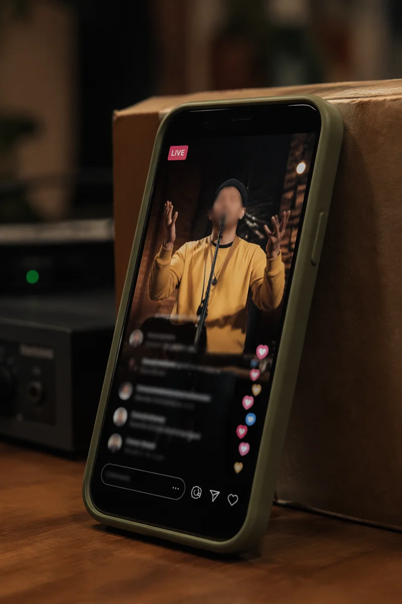 Smartphone Showing Blurred Live Stream Interface