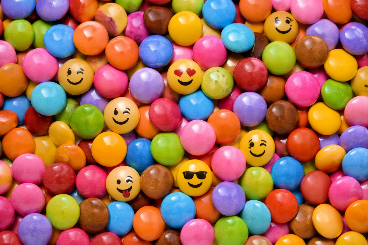 Colorful Emoji Candy Flat Lay Background