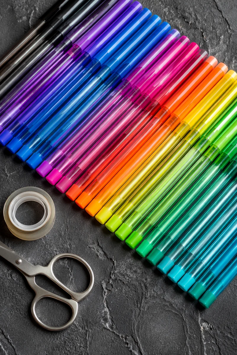 Rainbow Gel Pens on Charcoal Stone Desk