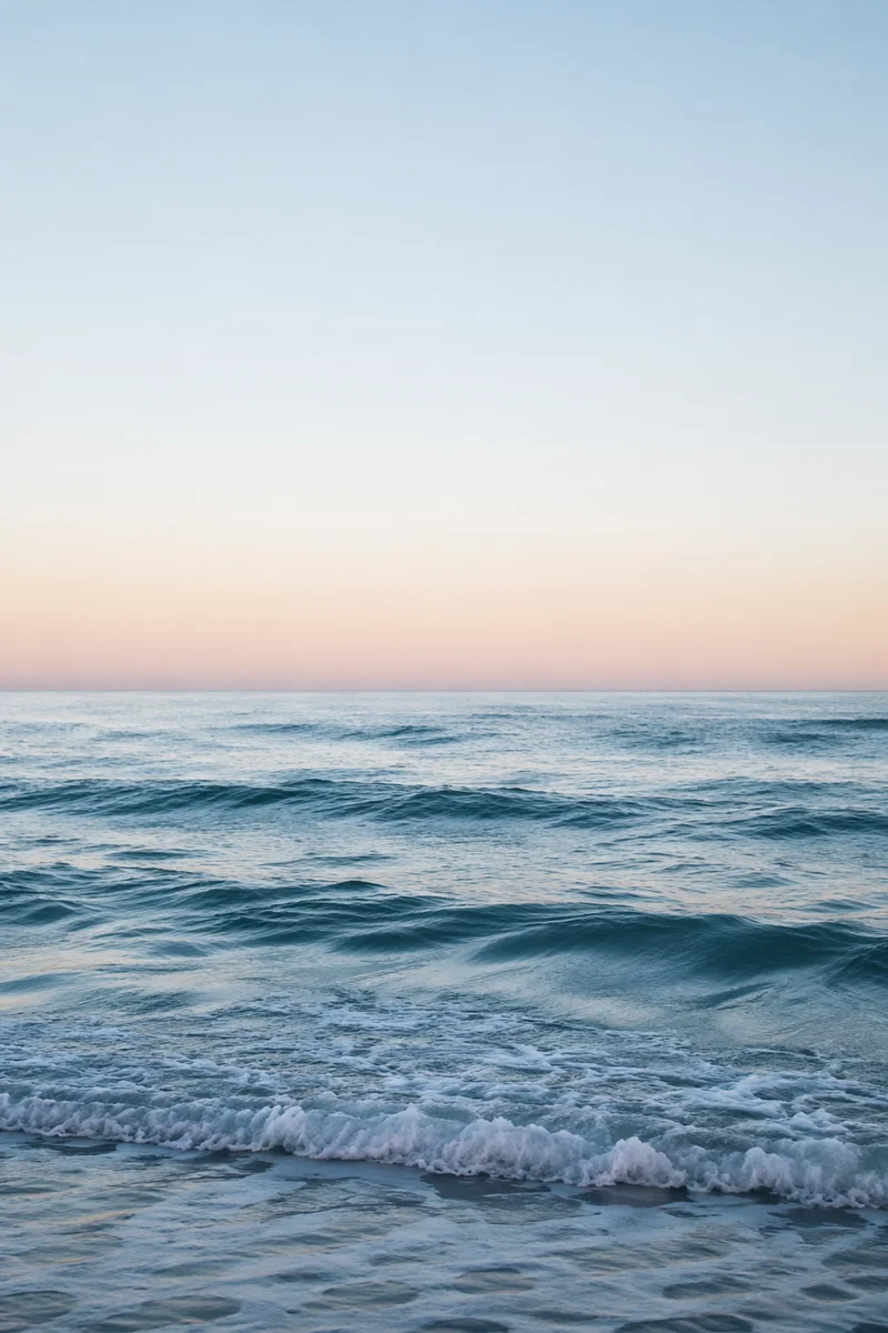 Calm Blue Ocean Waves at Dawn