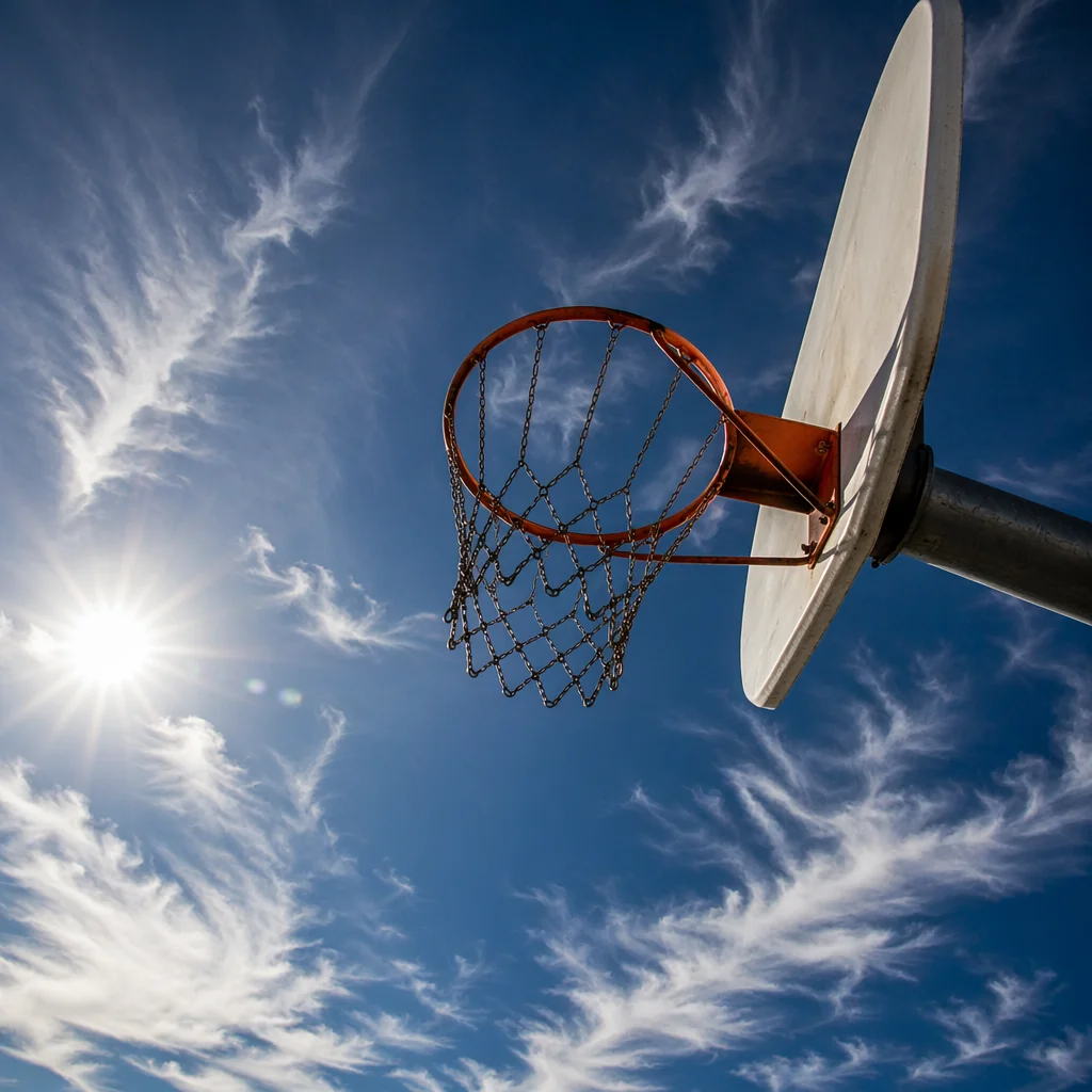 Outdoor Basketball Hoop Under Blue Sky
