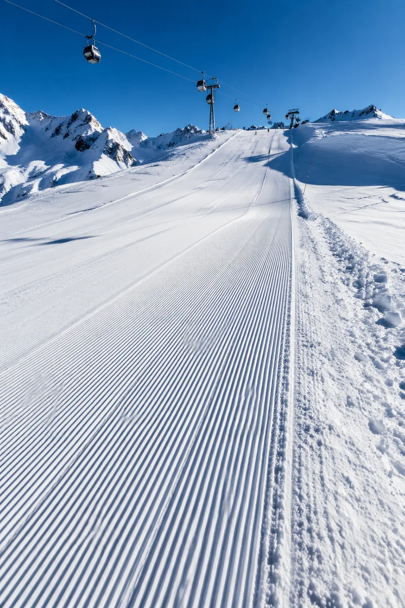 Fresh Groomed Alpine Downhill Ski Slope