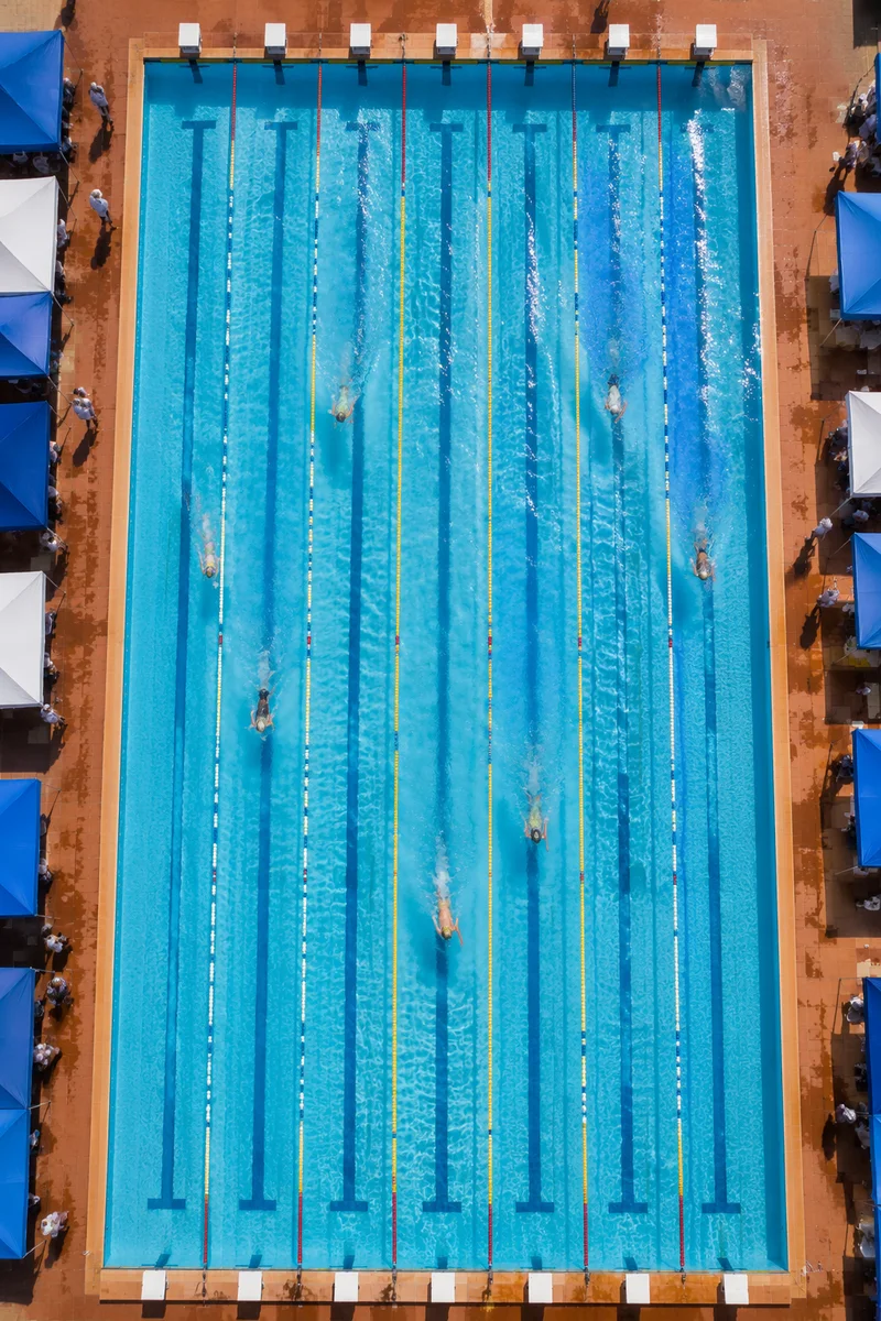 Overhead Swimming Pool Lanes in Blue Water