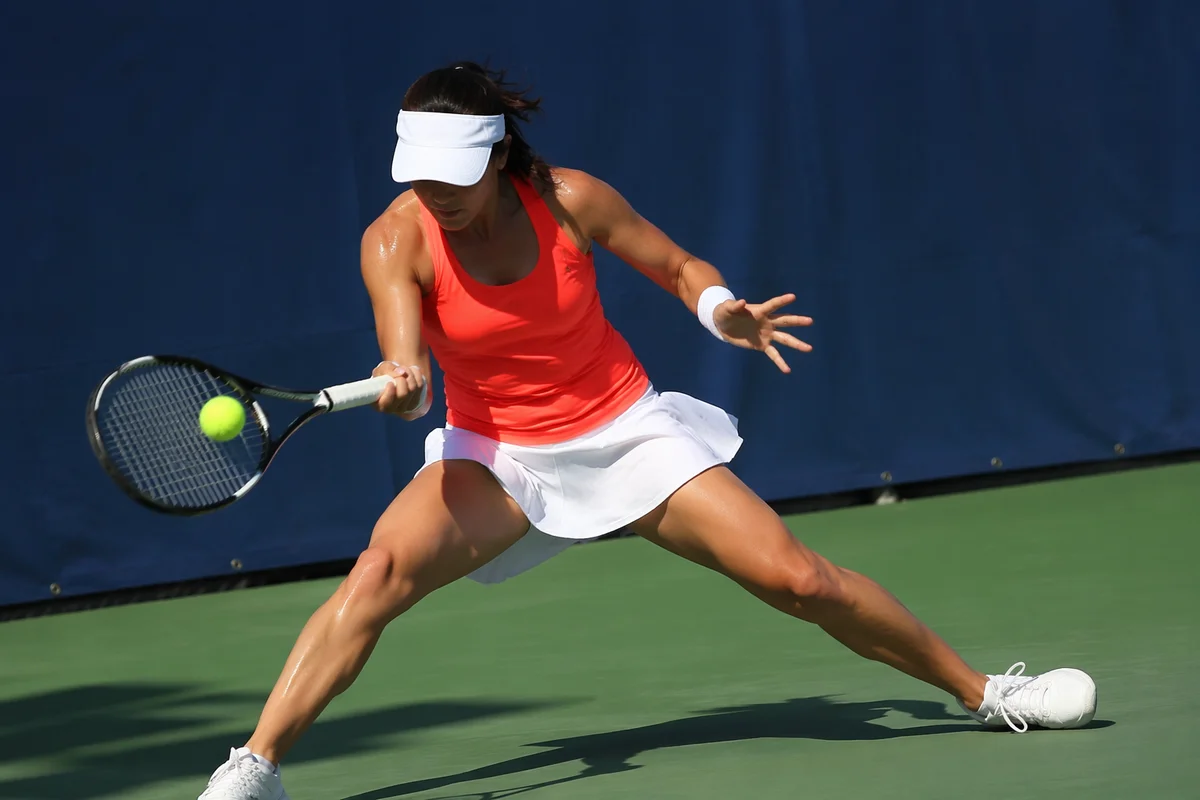 Dynamic Tennis Forehand on Outdoor Court
