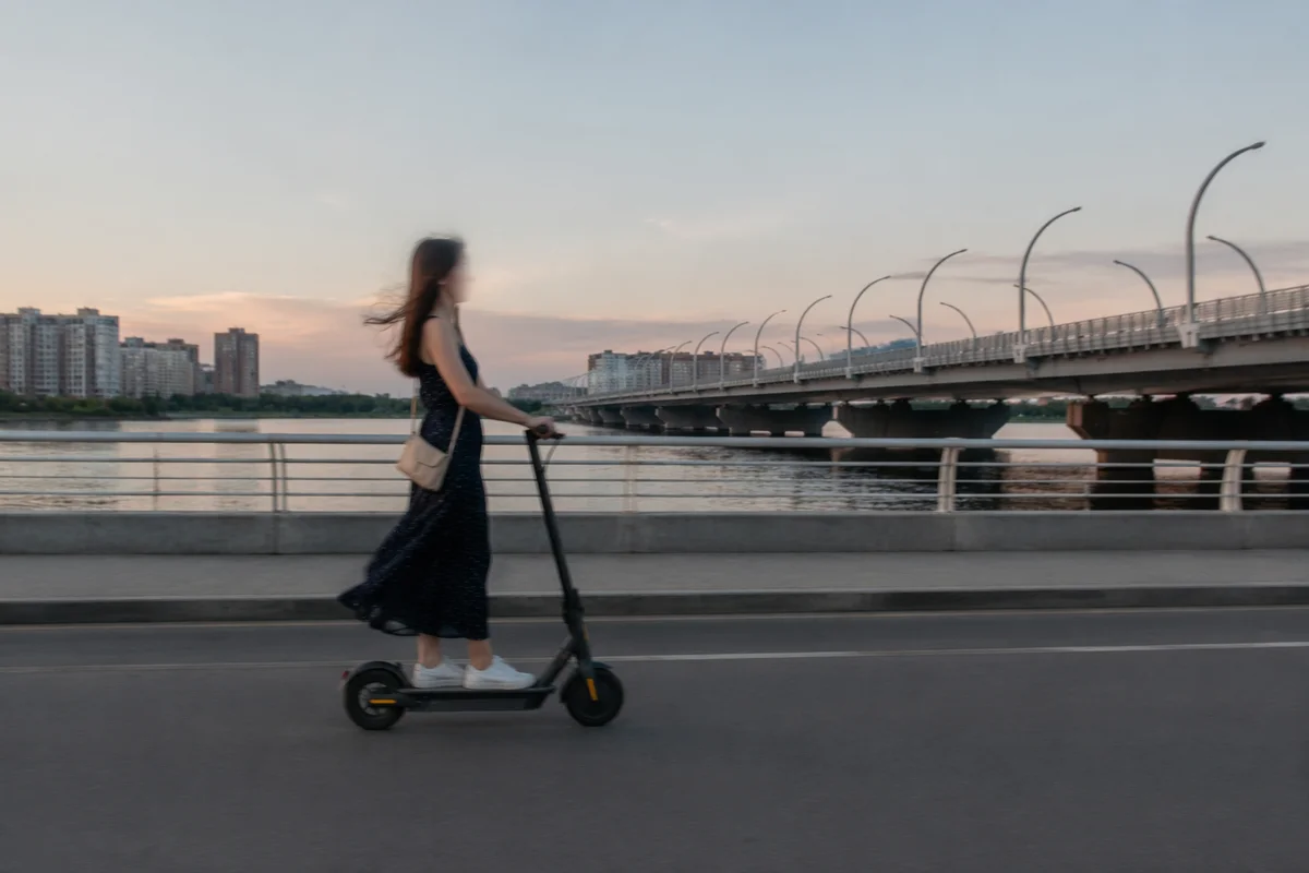 Evening Electric Scooter Ride by Riverside