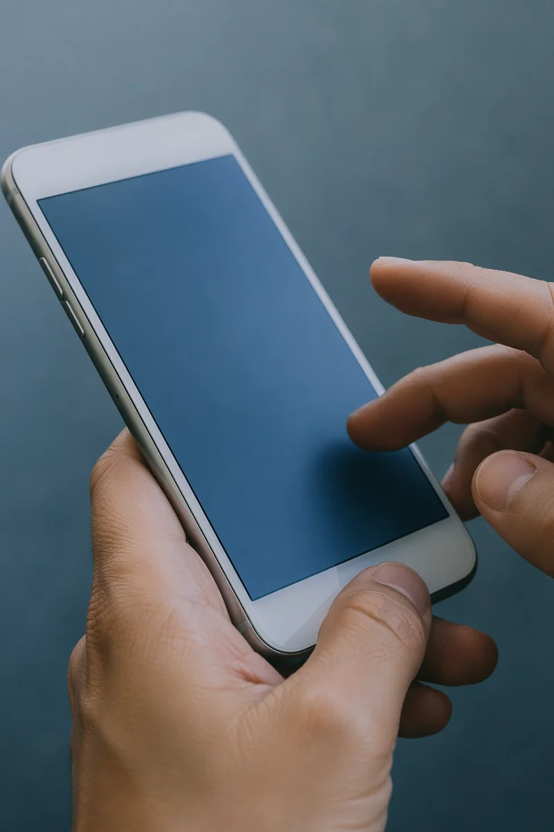 Close Up Hands Holding Smartphone Screen