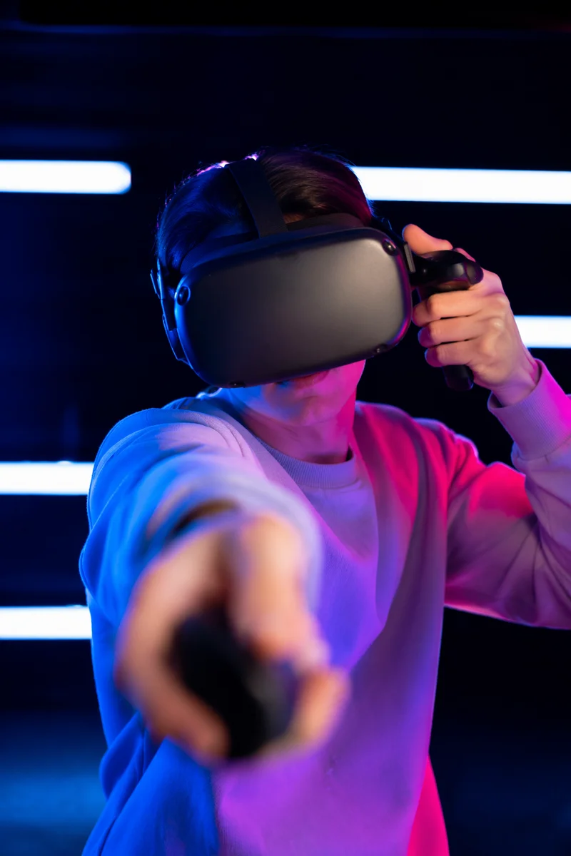 Person in VR Headset Reaching Forward