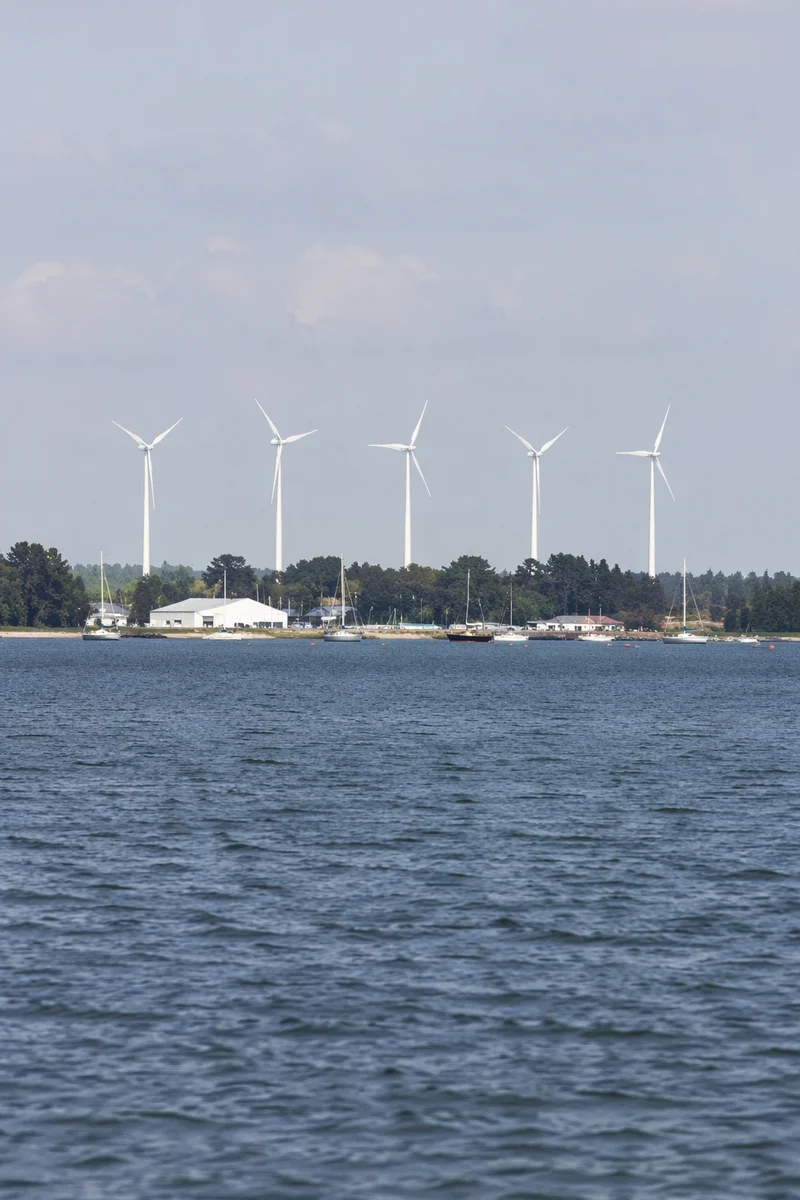Coastal Wind Turbines Across Quiet Inlet