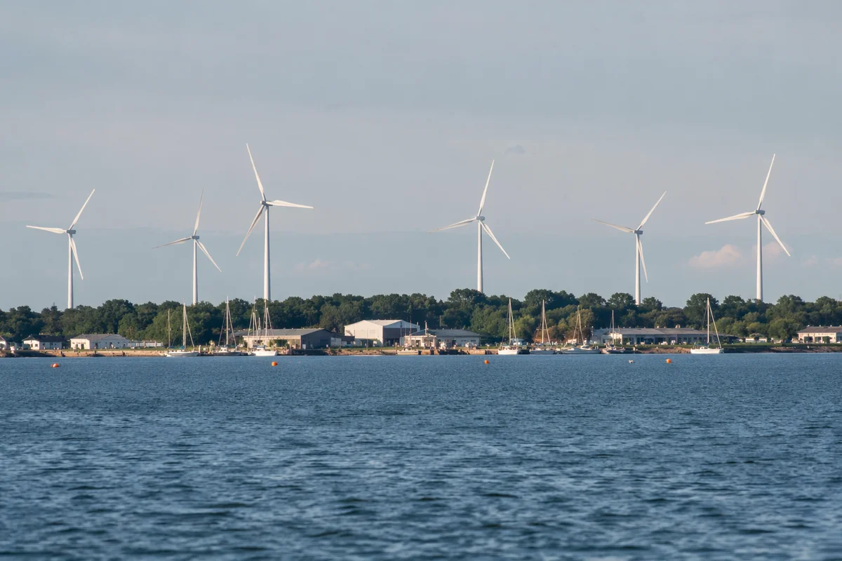 Coastal Wind Turbines Across Quiet Inlet