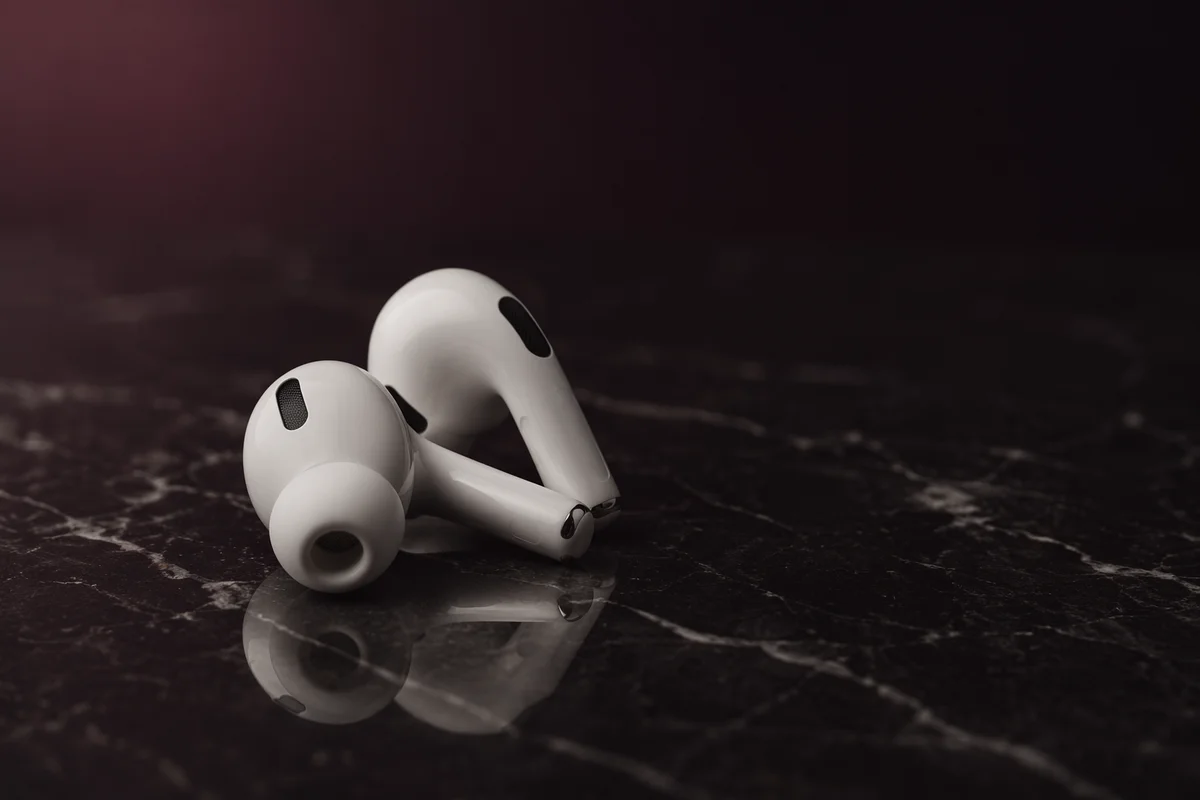 Minimal Wireless Earbuds on Dark Marble