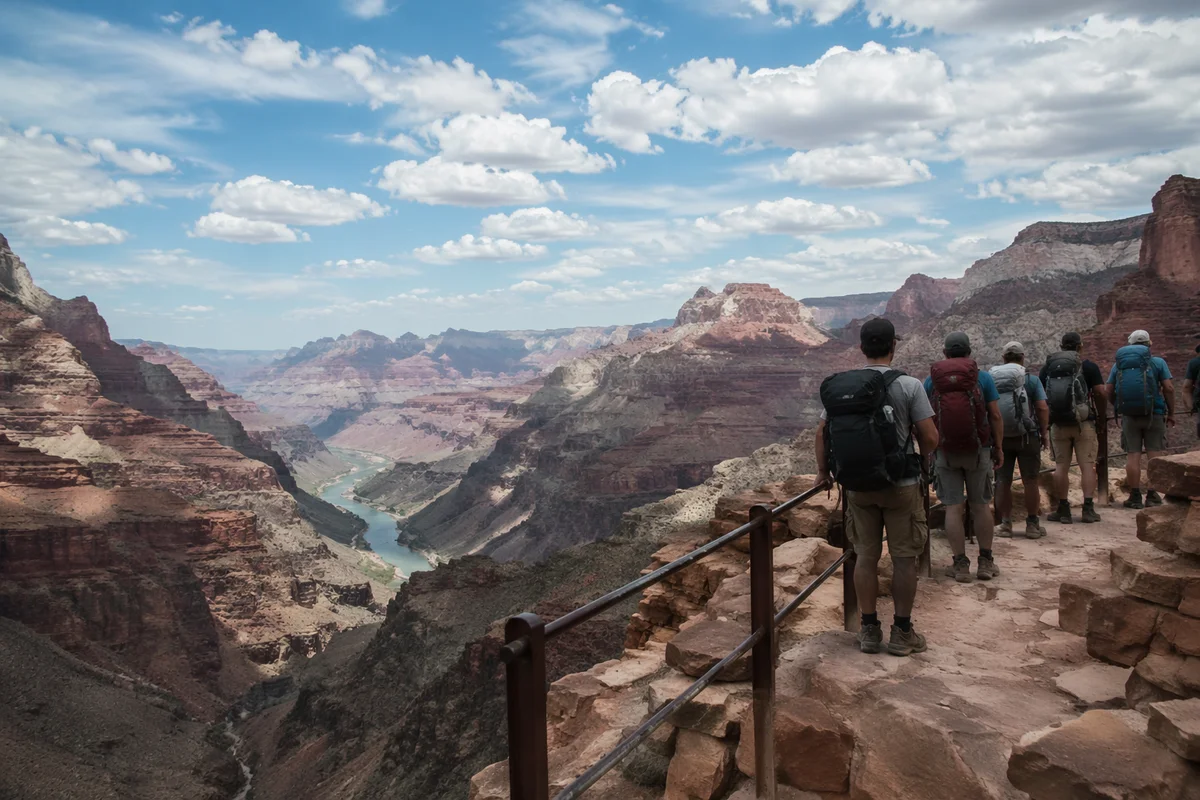 Backpack Hikers Overlooking Desert Mountain Canyon