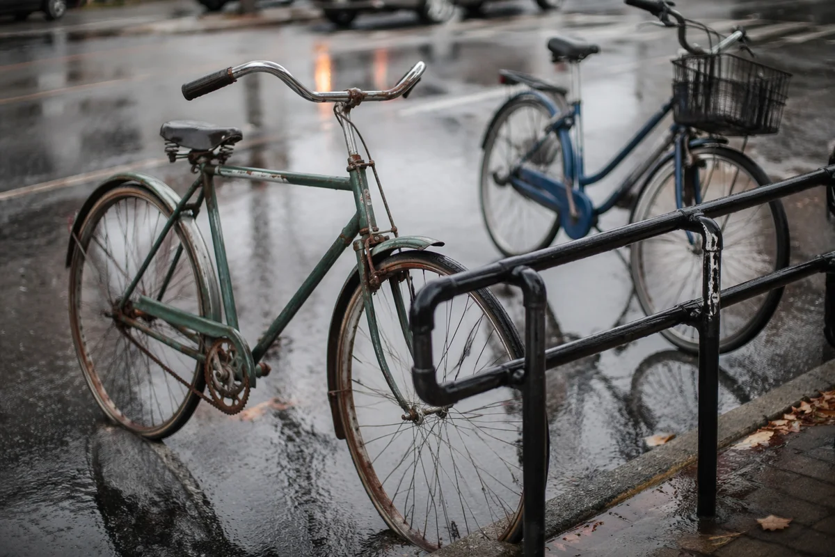 Rainy Urban Bicycle Commute on Wet Street