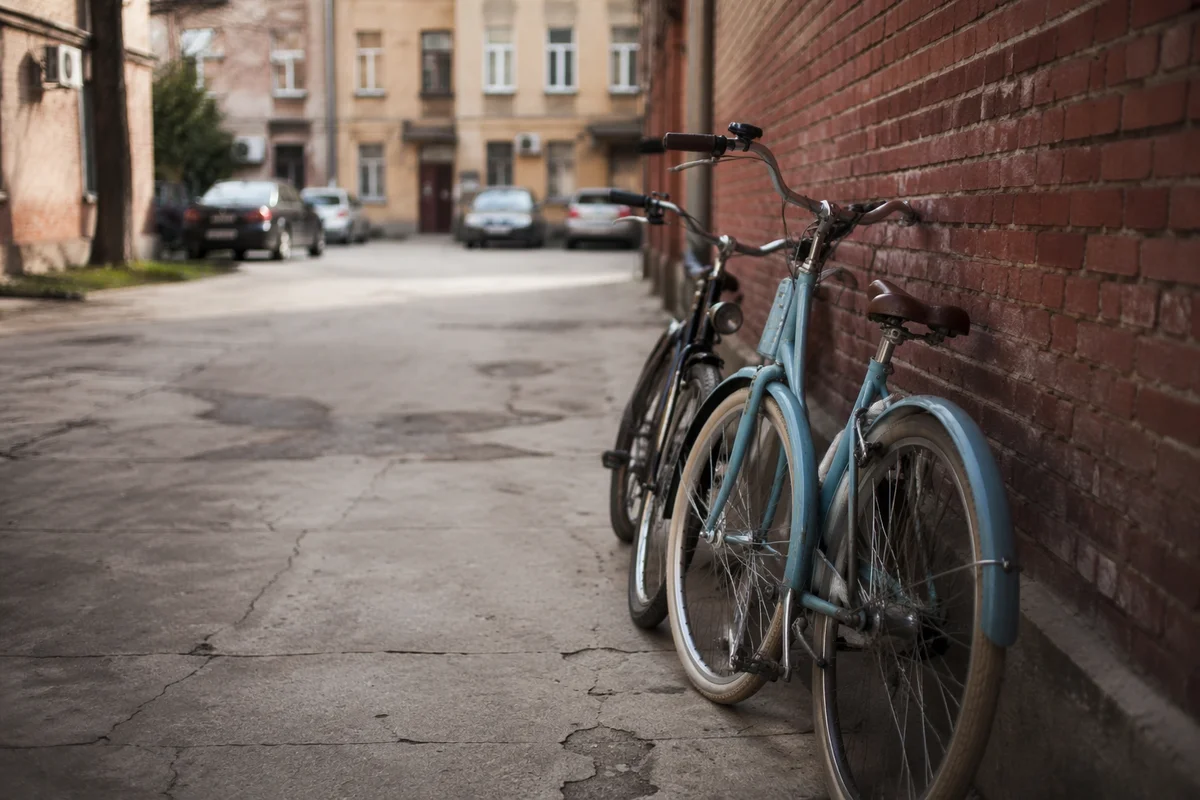 Vintage Bicycles by Red Brick Wall
