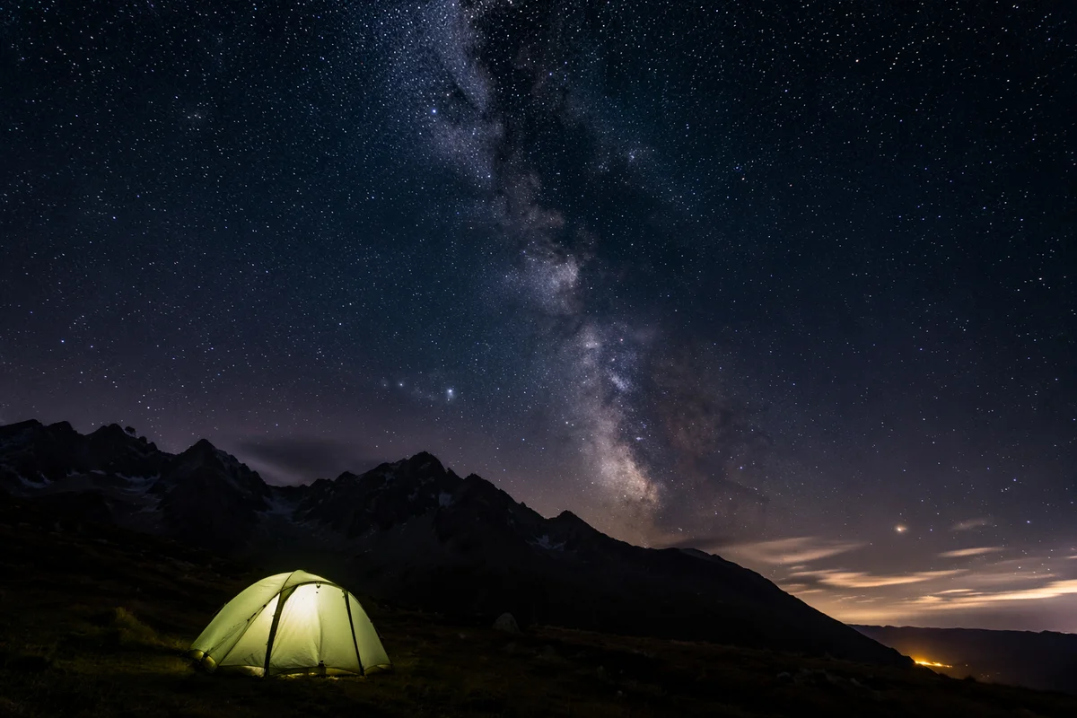 Glowing Tent Beneath Alpine Milky Way