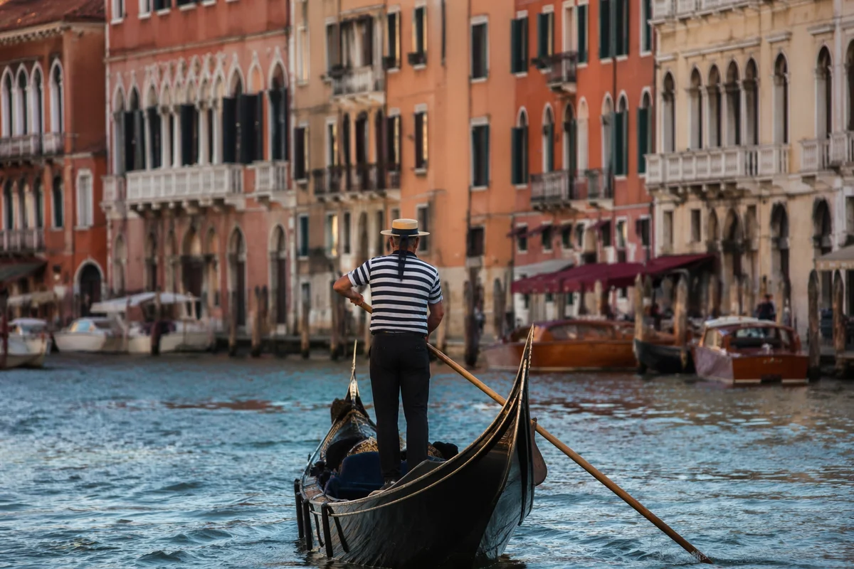 Romantic Gondola Along Venetian Canal