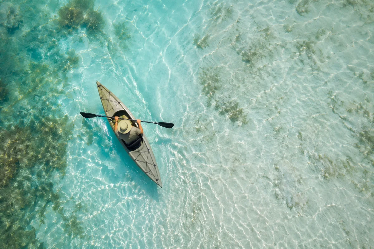 Overhead Kayak on Crystal Clear Water