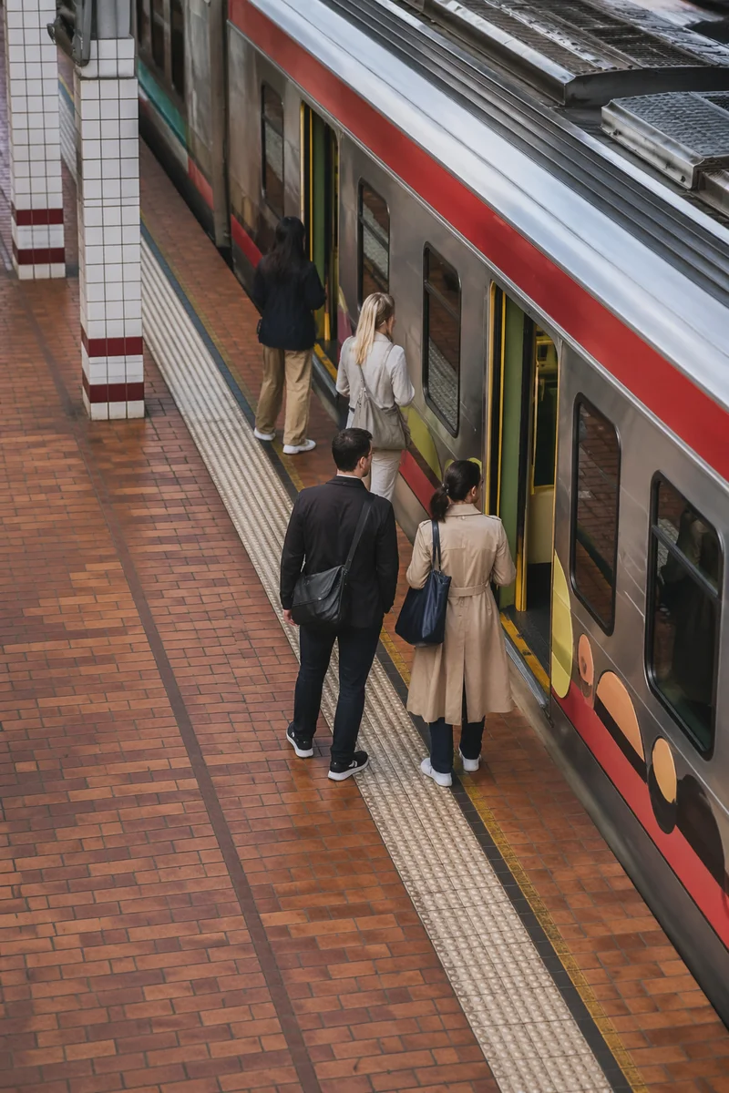 City Commuters Boarding Train at Platform