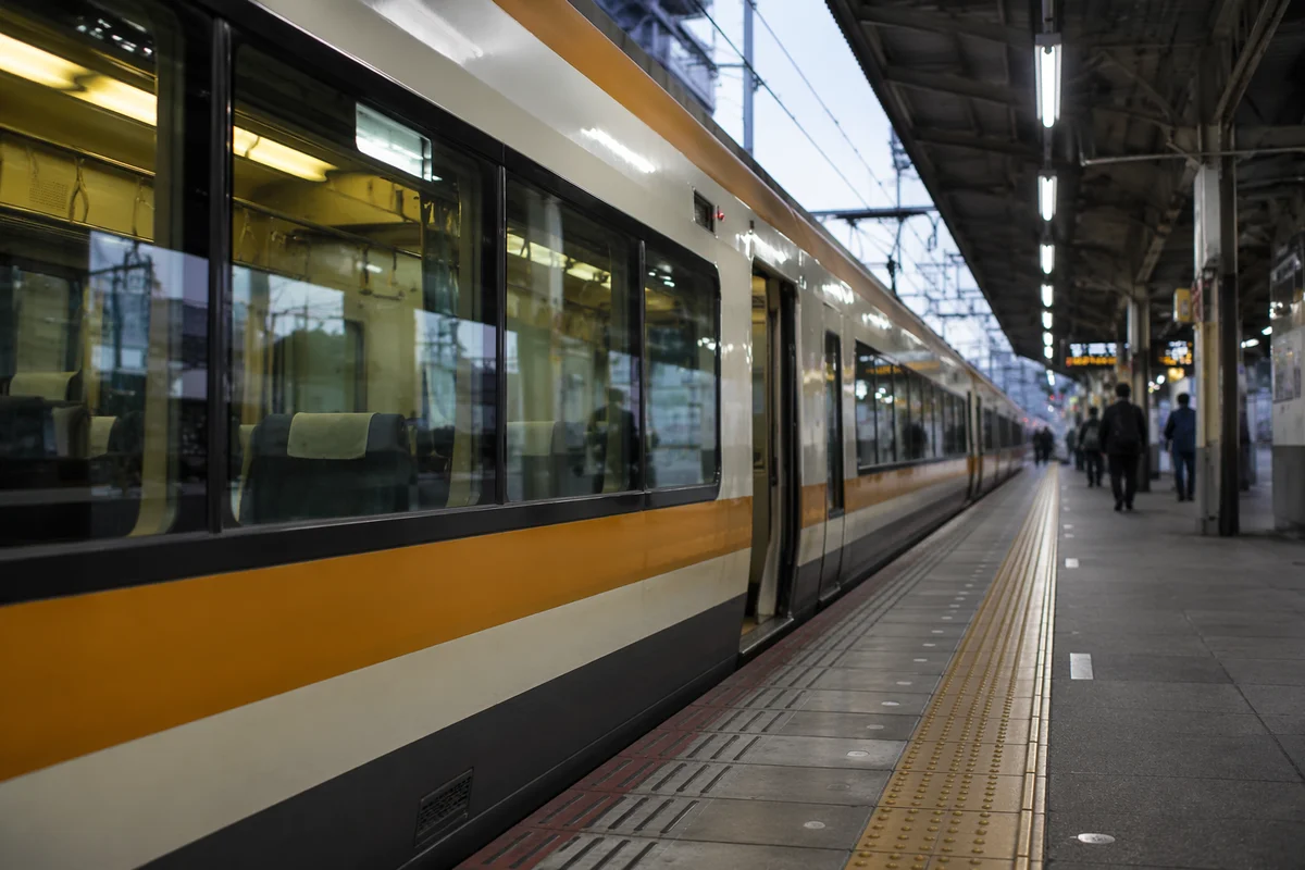 Morning Commuter Train at City Platform