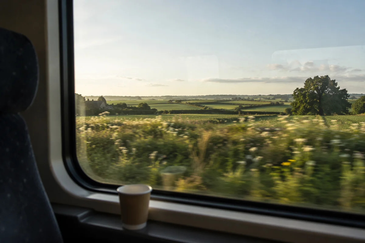 Quiet Train Window View of Countryside