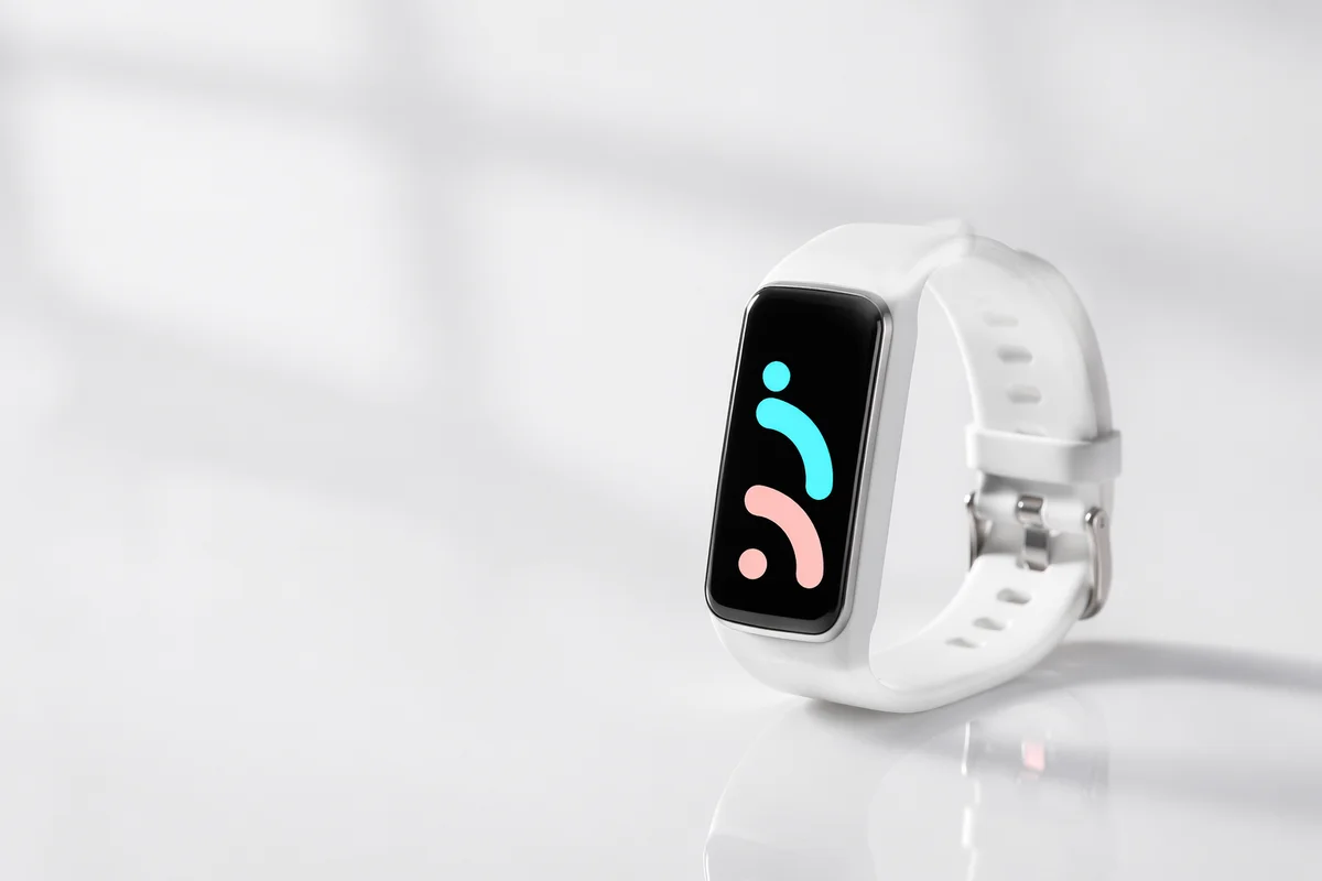 Minimal White Fitness Tracker on Wristband