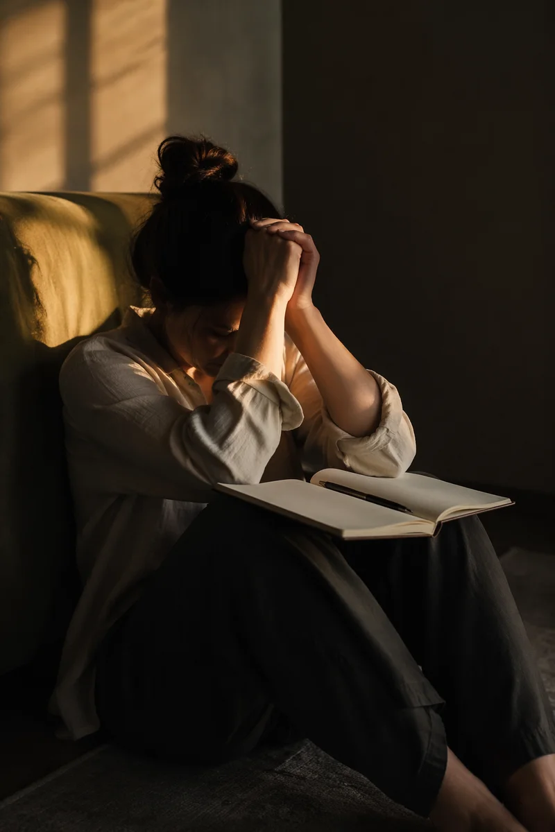 Quiet Journal Reflection in Warm Window Light