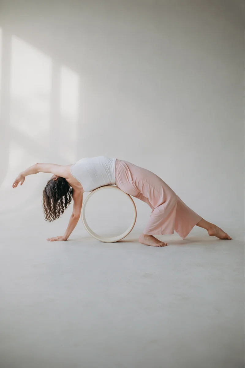 Supported Yoga Wheel Backbend in Wellness Studio