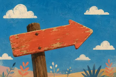 Red Wooden Arrow Sign Under Blue Sky