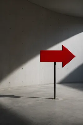 Red Directional Arrow in Minimal Concrete Space