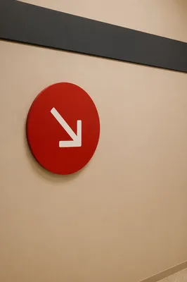 Minimalist Red Arrow Direction Sign Wall