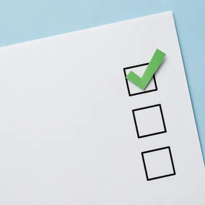 Green Checkmark Approval on Minimal Paper