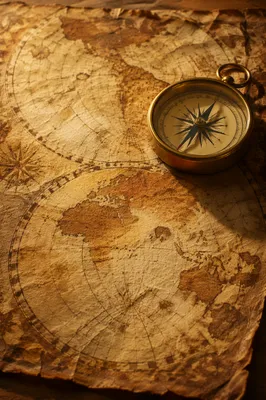 Antique Compass on Sepia Navigation Map